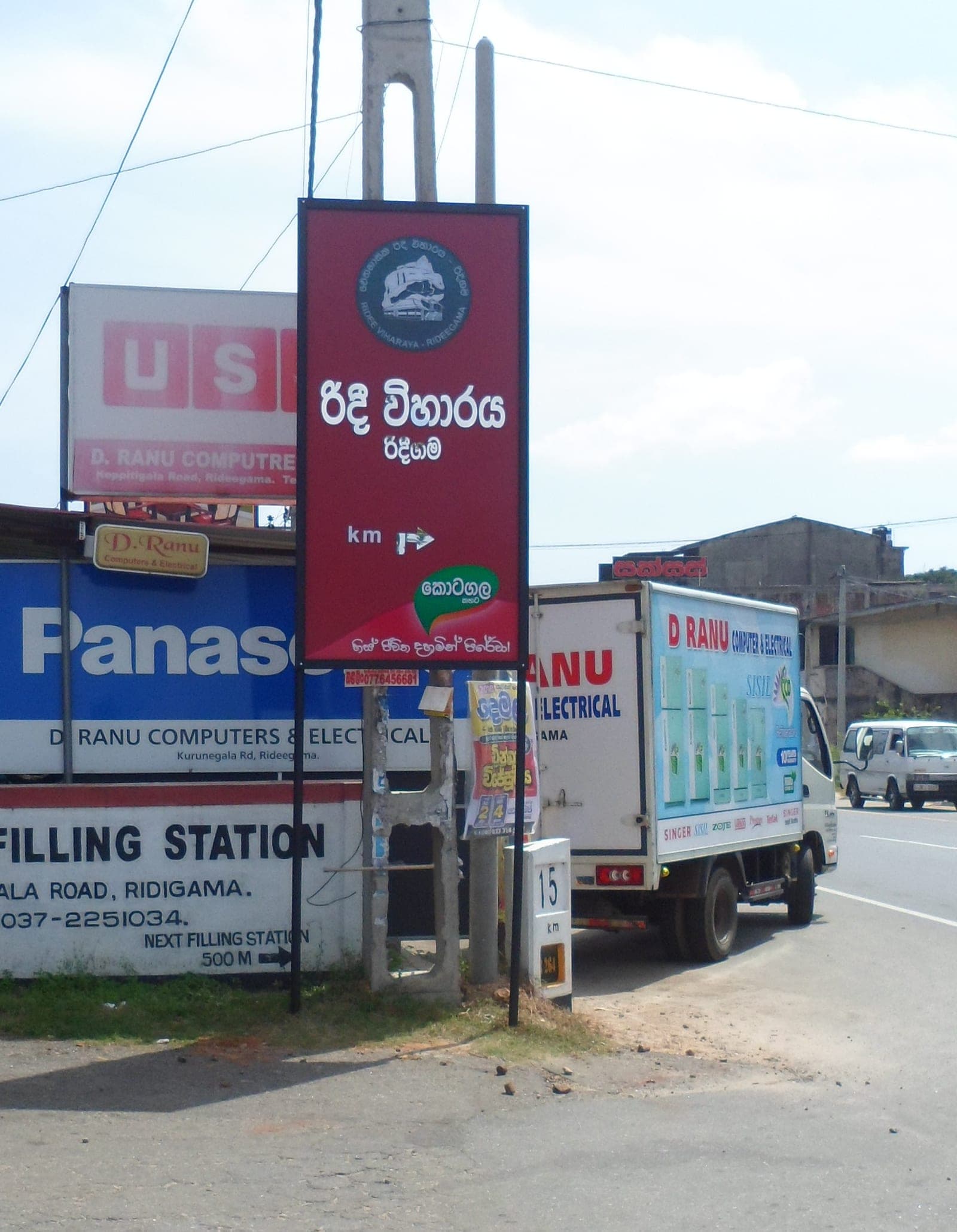 Roadside dealer boards and filling-station signage