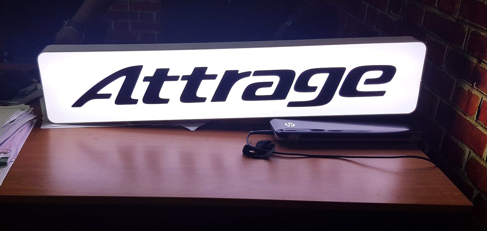 'Attrage' illuminated lightbox, close view