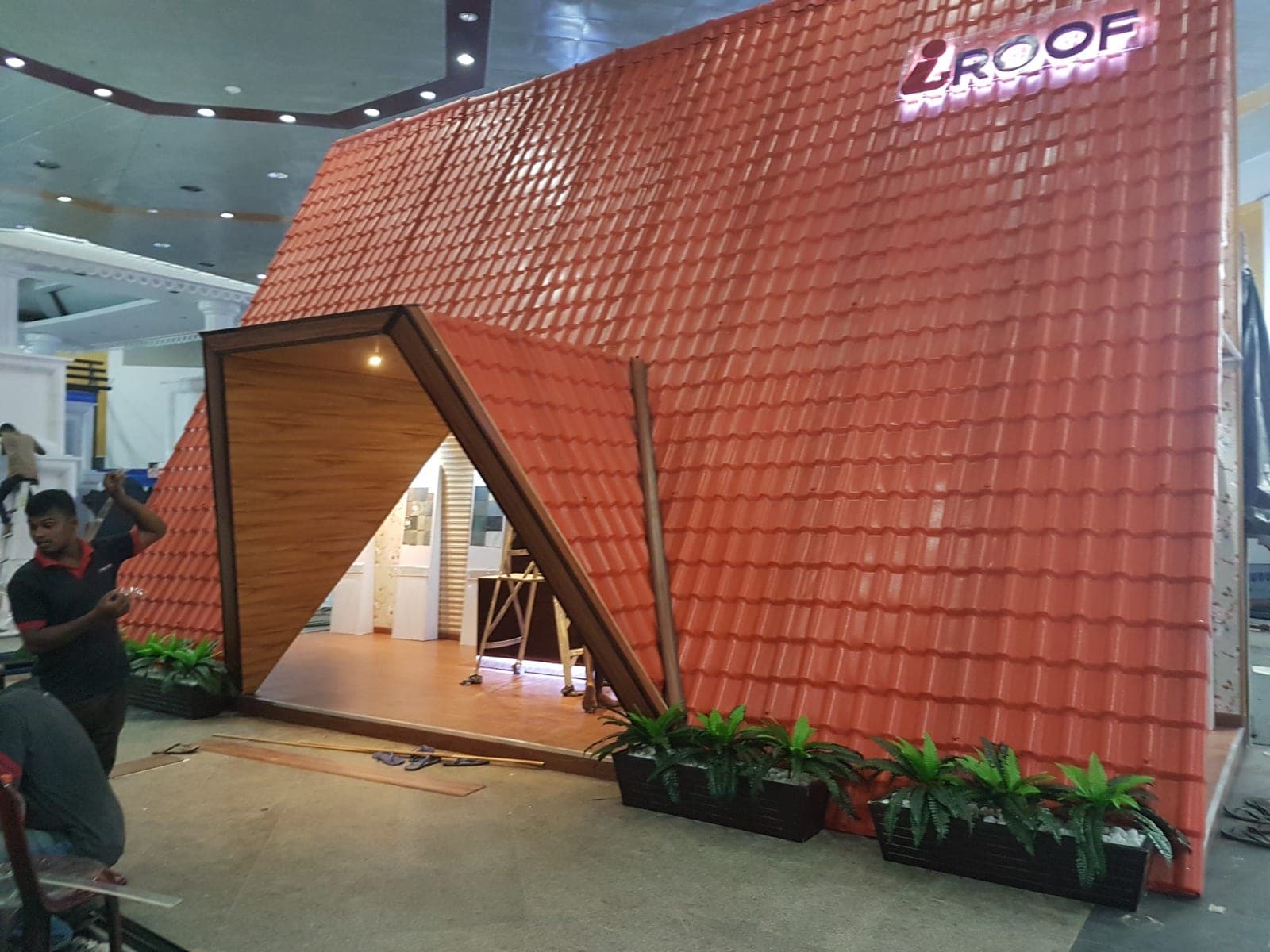 Exhibition display stand with a full clay roof-tile canopy
