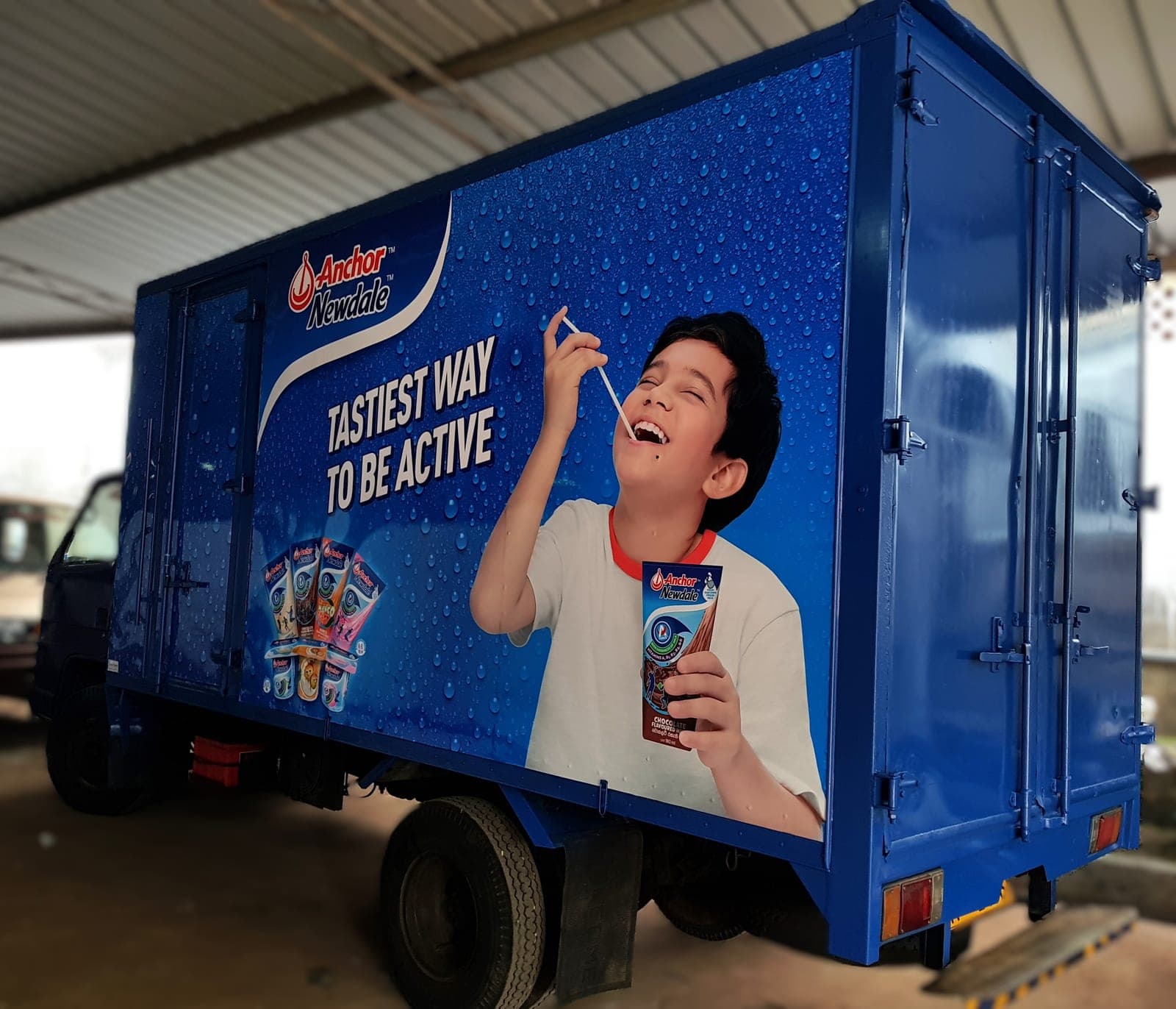 Anchor Newdale branded truck container, rear three-quarter view