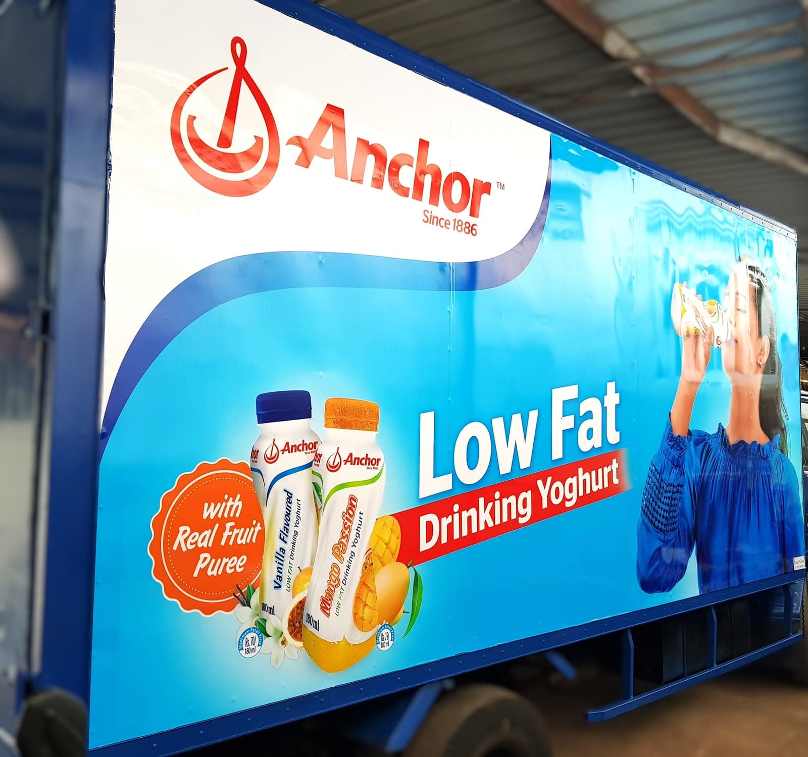 Anchor Low Fat drinking-yoghurt truck panel, close view of the product graphics